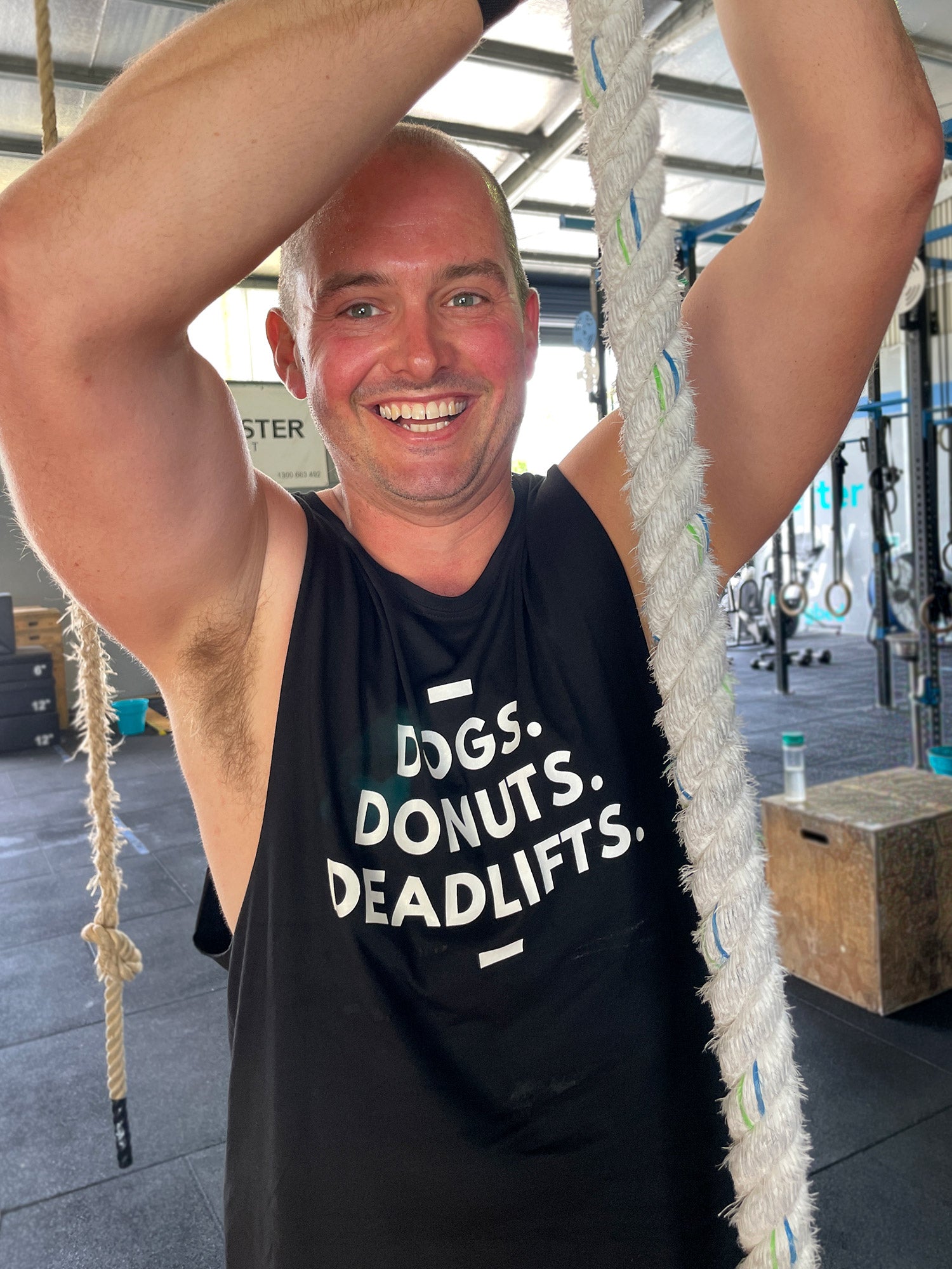 Dogs. Donuts. Deadlifts. Axel Drop Armhole Muscle Tank